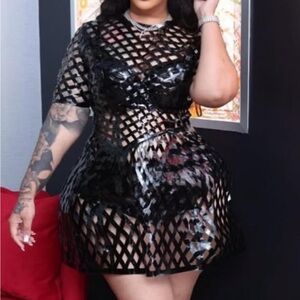 Caged patent leather dress